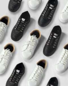 white and black adidas sneakers
