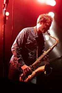 man playing saxophone