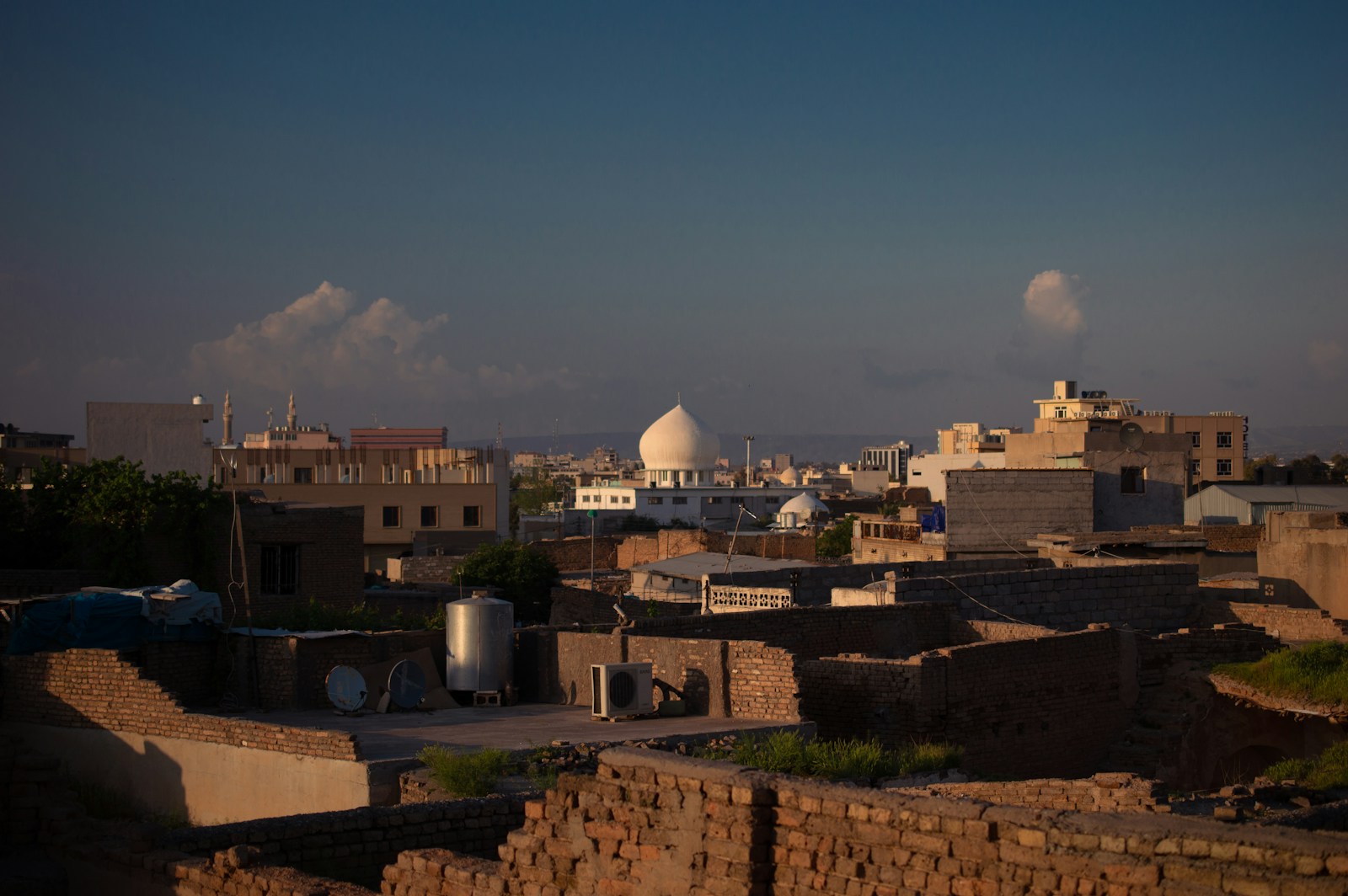 a view of a city from a rooftop