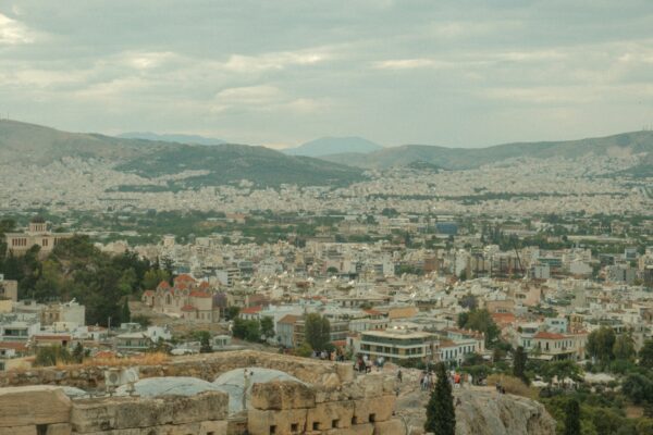 a view of a city from the top of a hill