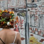 a woman with a flower crown on her head