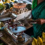 woman in front of stainless steel scale