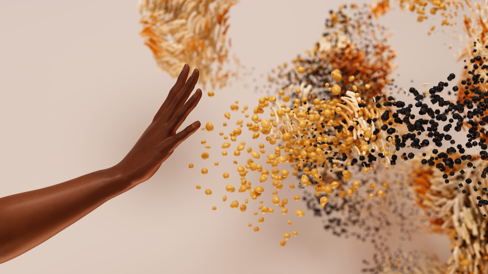 a hand reaching for a pile of seeds