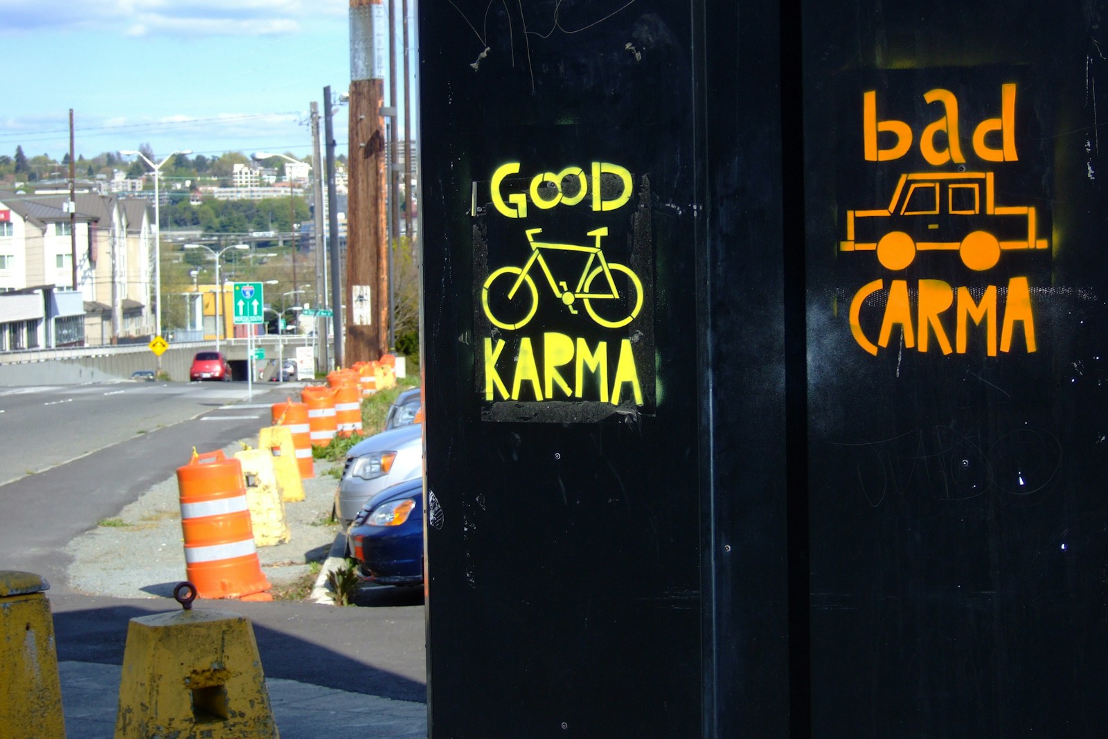 a couple of signs on the side of a road