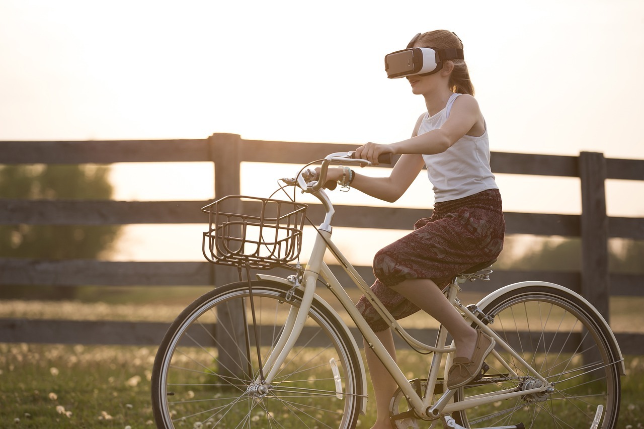 augmented reality, bicycle, girl, bike, child, cyclist, fence, fun, outdoors, person, virtual reality, virtual reality glasses, virtual reality goggles, virtual reality headset, metaverse, vr headset
