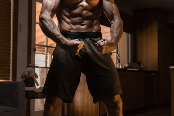 man flexing muscles