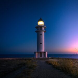 beach, nature, lighthouse, coast, light, illuminated, beacon, navigation, tower, watchtower, ocean, sea, seashore, signal, light signal, sunset, dusk, twilight